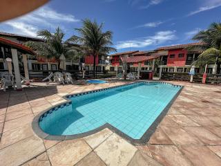 Casas no Residencial Mont Sinai com 2 ou 3 suítes (todas com ar), internet privativa 300MBPS a aproximadamento 250m da Praia de Taperapuã, condomínio com piscinas adulto e infantil, sauna, churrasqueiras e Segurança 24hrs. - 5