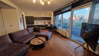 Modern skyline-view condo at a luxury complex - 8