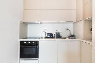 Refined 1bd apartment with an outdoor pool and sea view - 4