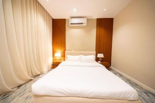 N18 Hotel-style 1BR with patio near Riyadh Front - 1