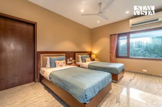 StayVista at Villa Aruna with Board Games, AC - 2