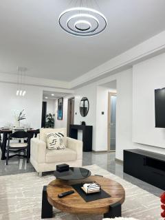 modern serenity suites apartments with swimming pool,modern equipped gym,private parking space, children playing ground, proximity to major shopping malls and unbeatable city views - 7