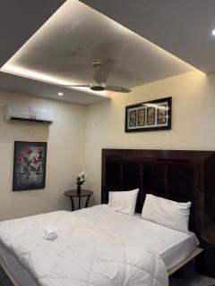 Comfort 2BHK Self CheckIn DHA Lahore - 5