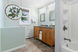 Charming home with stunning bay views, sunroom, gazebo, deck, & grill - 2