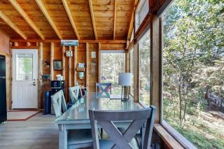 Lakefront cottage with dock, screened porch, & Island in Biscay Pond - 1