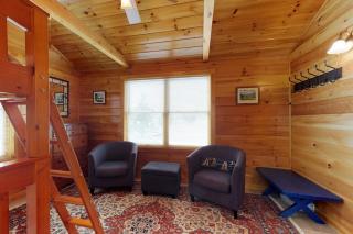 Two lakefront dog-friendly cabins on four acres with porches, dock, & lake views - 5