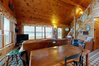 Cozy, dog-friendly waterfront cabin with large yard, porch, dock, & lake views - 5