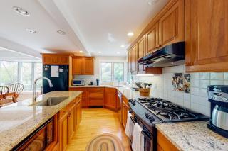 Renovated farmhouse on an acreage with grill, four-bedrooms, & W/D - river views - 2