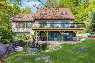 Spacious Lakefront Home with a Sandy Beach, Kayaks, and Stunning Panoramic Views - 0