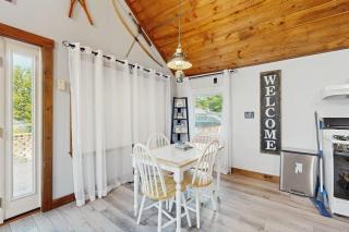 Scenic retreat with a spacious deck, gas fireplace, and Moosehead Lake views - 1