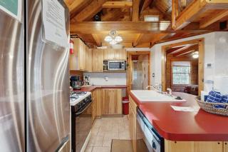 Cozy cabin with covered porch, firepit, grill, fireplace, & washer/dryer - 1