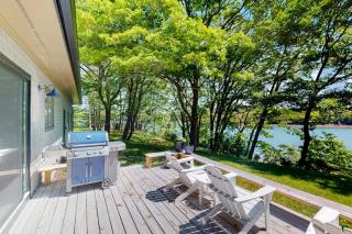 Water-view retreat with beach access, deck, grill, EV charger & lawn games - 7