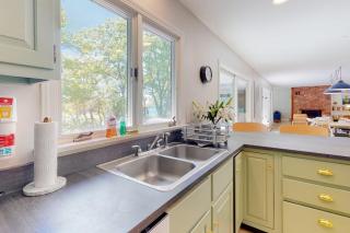 Water-view retreat with beach access, deck, grill, EV charger & lawn games - 6