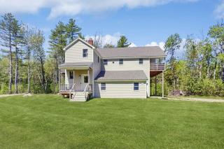 Modern farmhouse with deck, firepit, & balcony - 0