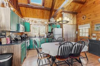 Charming riverfront home with cozy interiors, dock, and scenic deck views - 2