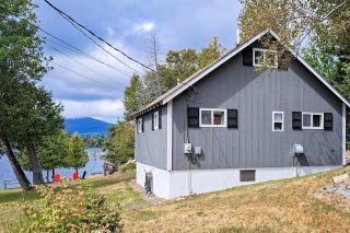 Lakefront, cabin-inspired home with firepit, grill, & screened porch, Wifi - 0
