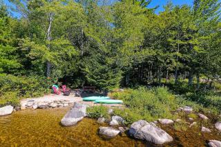 Quiet lakefront cottage with a firepit, private beach, & two kayaks - 4