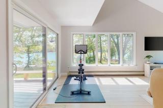 Water-view retreat with beach access, deck, grill, EV charger & lawn games - 1