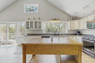 Modern farmhouse with deck, firepit, & balcony - 2