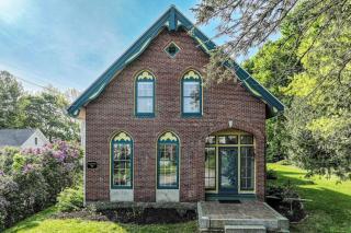 Elegant Victorian Gothic Revival home with wet bar, sunroom, & washer/dryer - 0