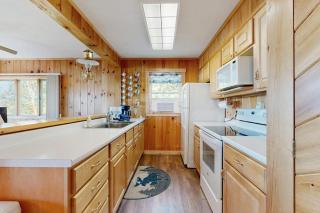 Lakefront home with private dock, mooring, pebble beach, grill, & firepit - 2