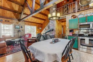 Charming riverfront home with cozy interiors, dock, and scenic deck views - 3