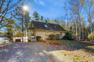 Charming riverfront home with cozy interiors, dock, and scenic deck views - 7