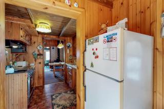 Lakefront cabin with private boat ramp, lake access, wrap-around porch, firepit - 8