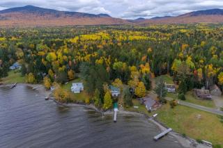 Lakefront cabin with private boat ramp, lake access, wrap-around porch, firepit - 1