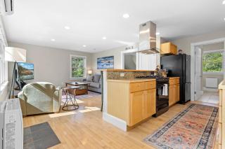 Charming coastal cottage with deck, grill, firepit, and jetted tub - 1