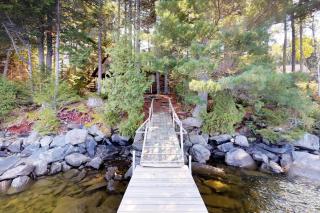 Lakefront cabin with private dock & beach access - 8