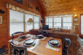 Two lakefront dog-friendly cabins on four acres with porches, dock, & lake views - 2