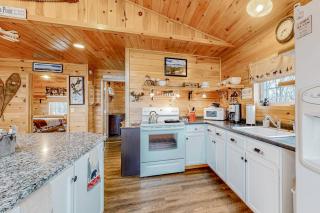 Lake-view two-story home with beach access, wood stove, grill, W/D, & fast WiFi - 2