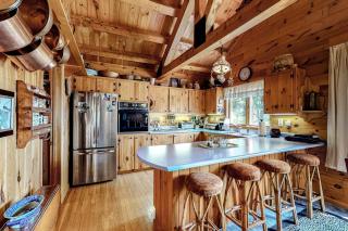 Waterfront Home on Moose River with Firepit, Porch, Pool Table, Great River View - 1