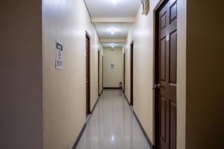 RedDoorz at Perpetual Tanguile Travellers Inn - 6