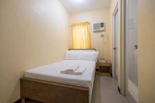 RedDoorz at Perpetual Tanguile Travellers Inn - 5