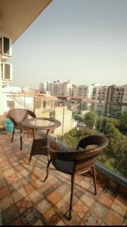 The Ivory Nest Stylish 2BHK Near Shastradhara - 1