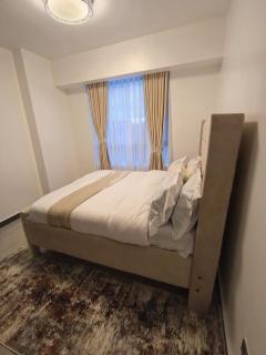 newly furnished three bedroom apartment with swimming pool fully equipped gym children playground ample parking space and unbeatable scenic city views - 5