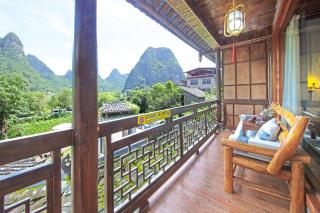阳朔赴山海翠影楼酒店遇龙河景区店Yangshuo Scenic Mountain Retreat - 1