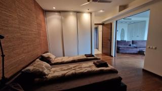 Modern skyline-view condo at a luxury complex - 4