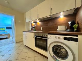 AVINORA Gemütliche Ferienwohnung mit Bergblick - 6