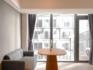 Studio Apartment with Sofa at Carstensz Residence By Travelio - 6