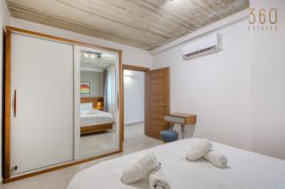 4BR Modern Retreat with Pool Access in Swieqi - 4