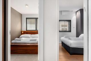 Vibrant Modern 2BR steps to the Beach by HolyGuest - 1