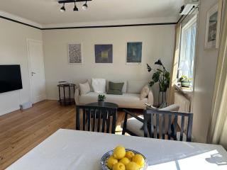 A cozy apartment surrounded by greenery - 0