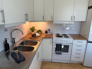 A cozy apartment surrounded by greenery - 9