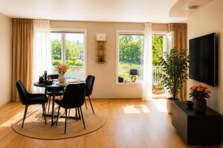 Bright apartment with parking and a balcony - 0