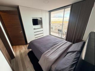 Amplio apartamento con vista a Quito - 2 parqueos - 1