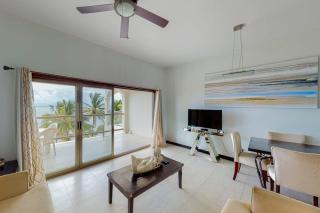 Beachfront condo with ocean views WiFi partial AC & shared pool dock kayaks - 0