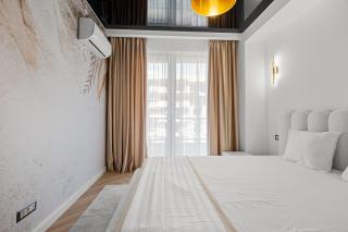 Modern Luxury Retreat with Private Balcony by Blvd - 5